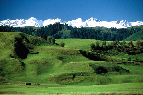 Foothills of the Tian Shan mountain range (Photograph from:  A Glimpse of Xinjiang)
